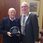 John McIlroy receives award from President David